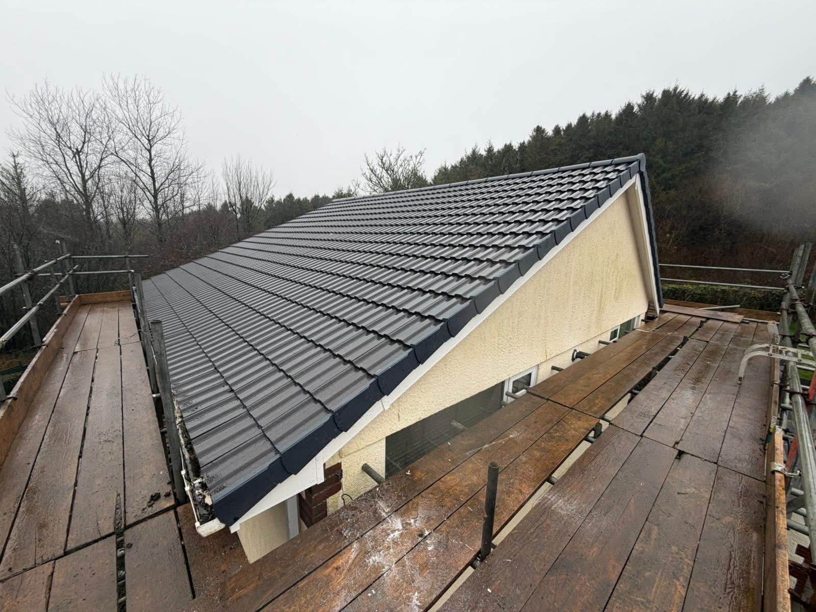 A completed roofing and building project by J P Building Services