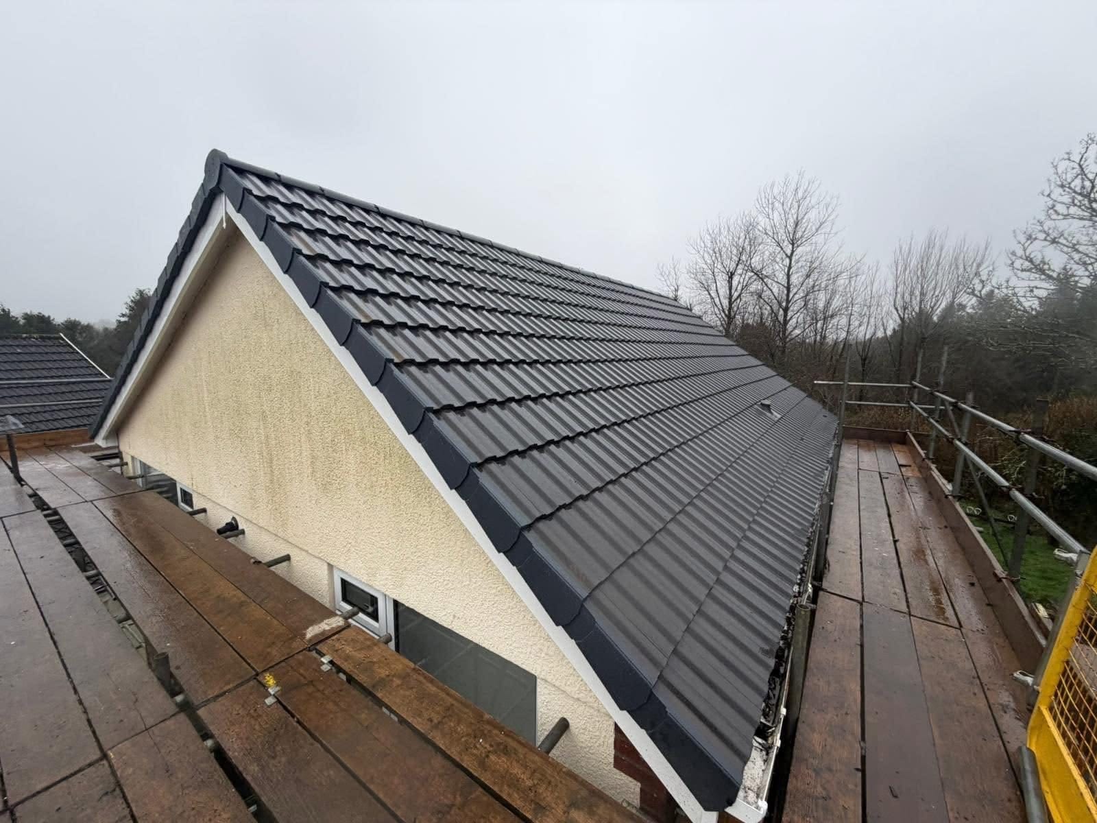 A completed roofing and building project by J P Building Services