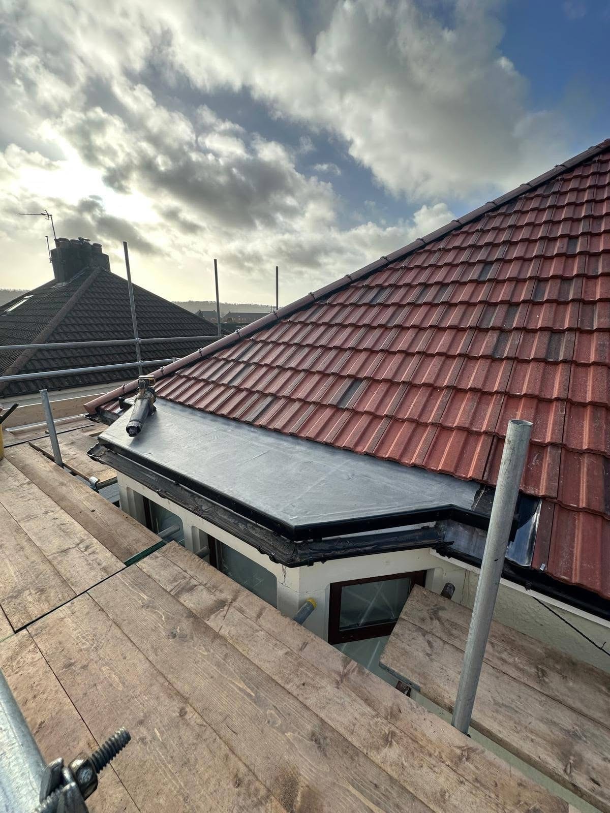 A completed roofing and building project by J P Building Services