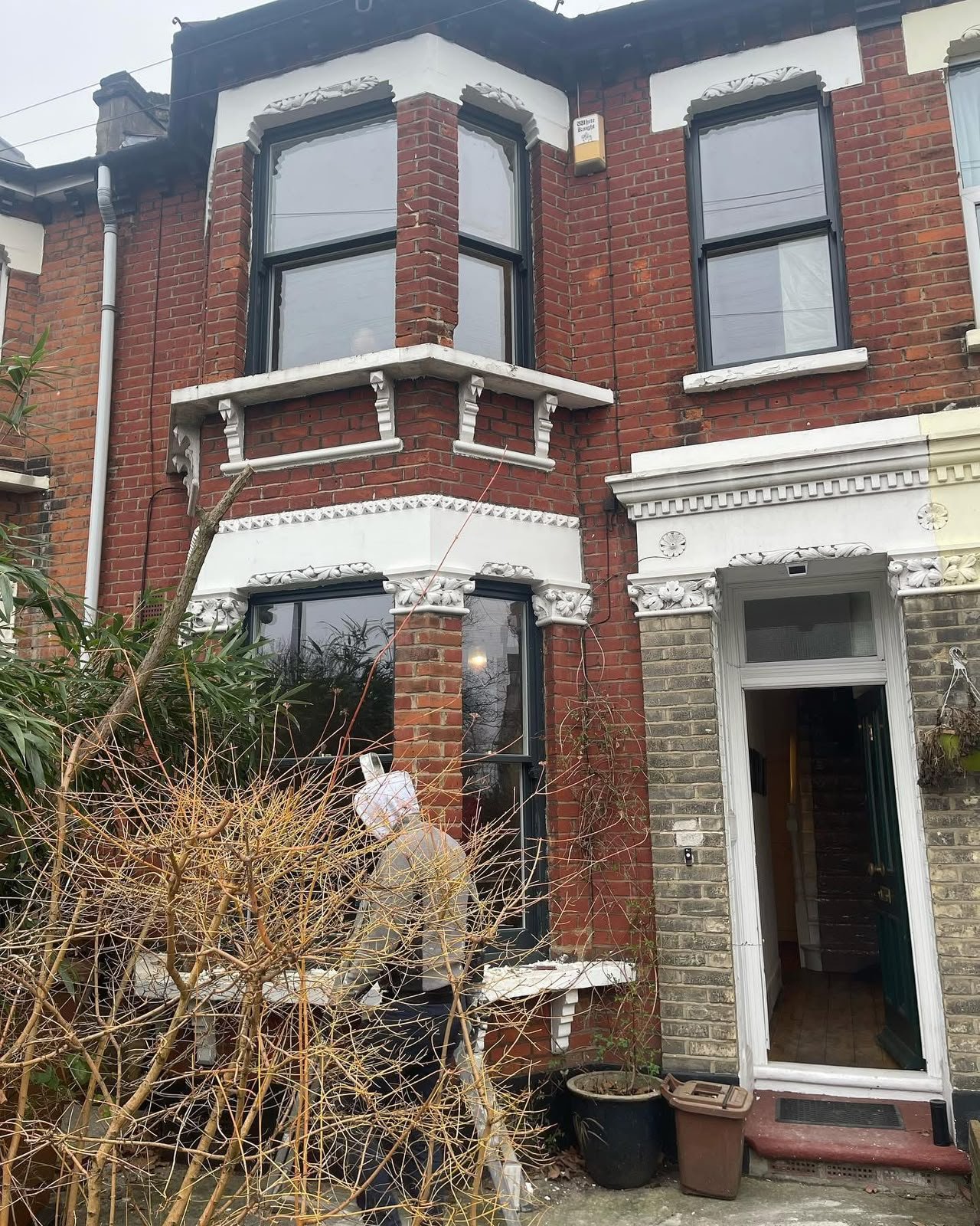 A completed building and restoration project on a brick home by J P Building Services