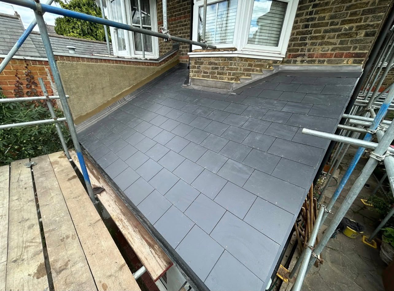 A completed slate flat roof by J P Building Services