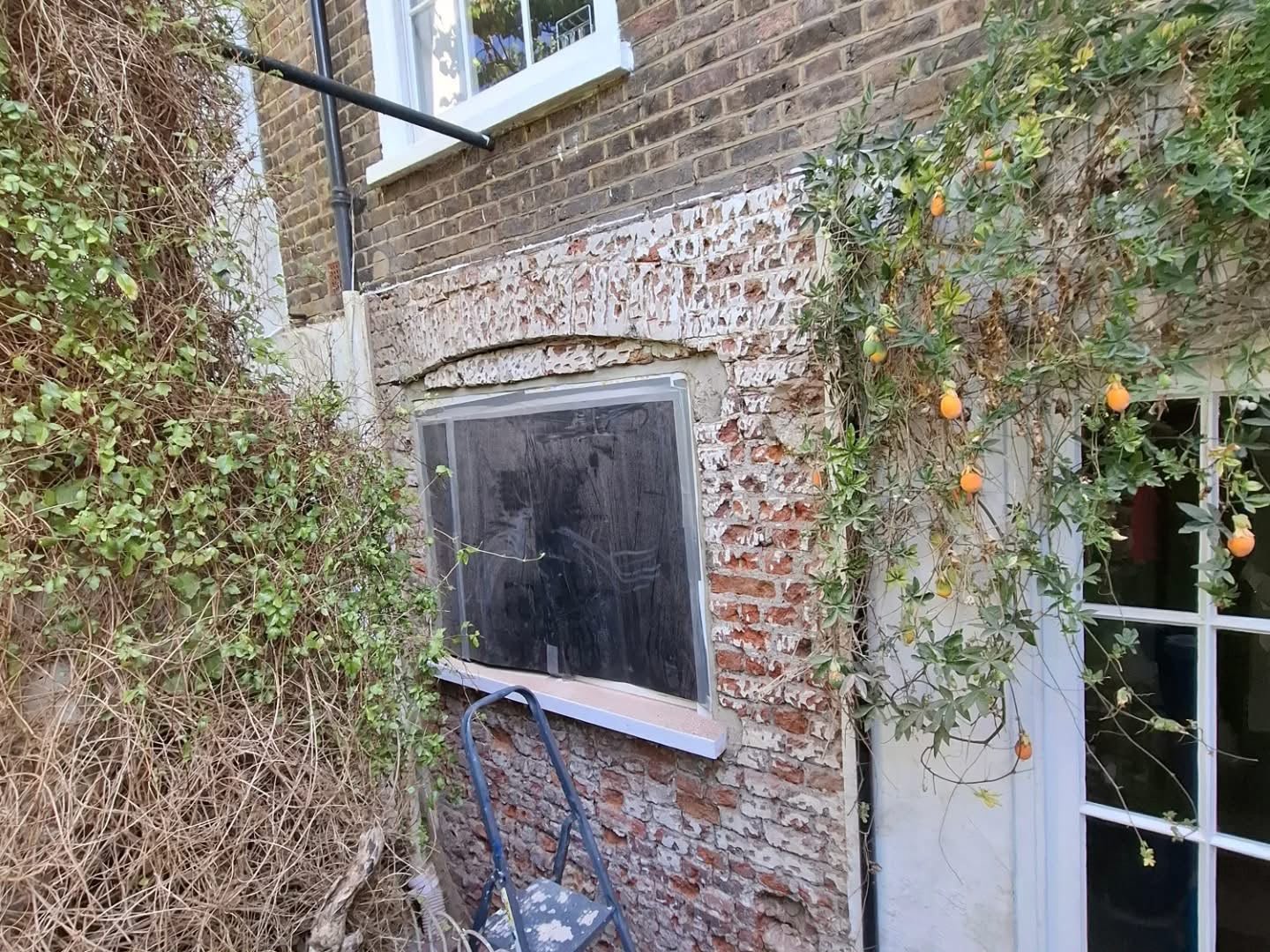 Completed brickwork and window restoration by J P Building Services