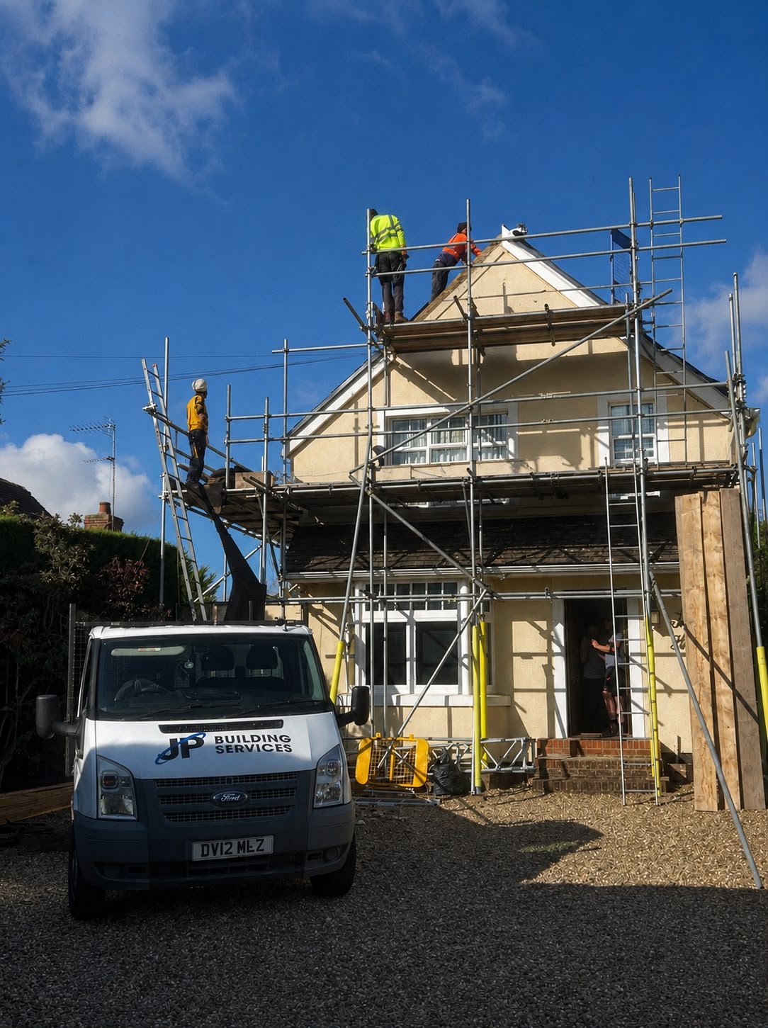 A re-roofing project with scaffolding by J P Building Services