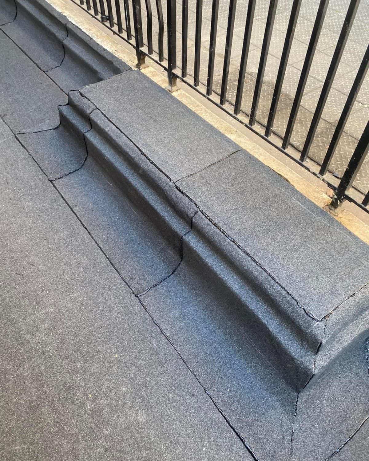 A newly laid flat roof on a house extension